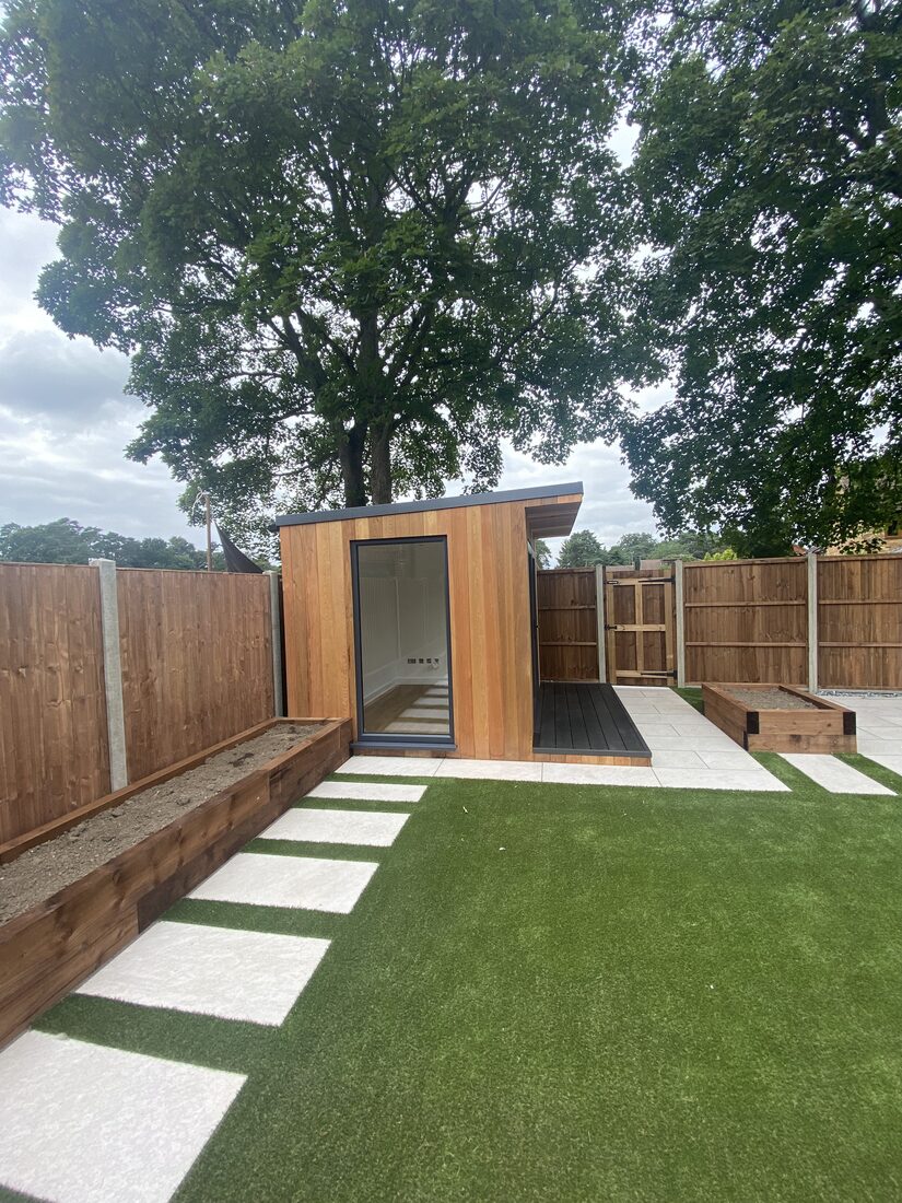 Modern garden room with large lawn